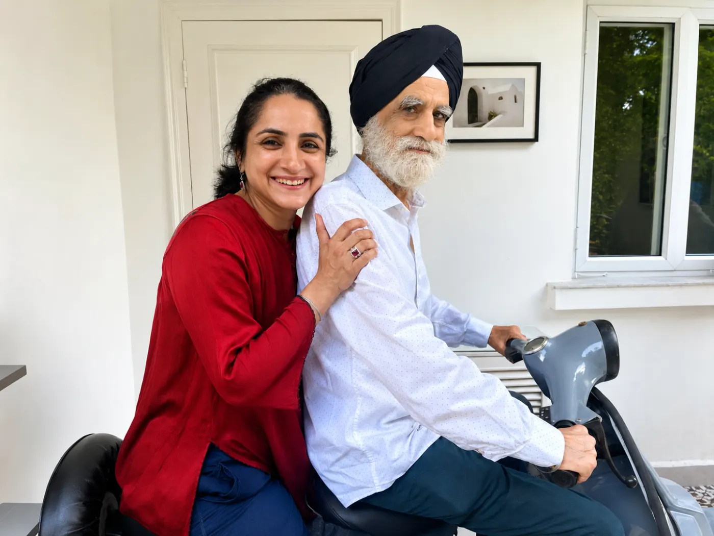 A member of the Chugh family with Pritamsingh Meharsingh Chugh at their ArtRest home