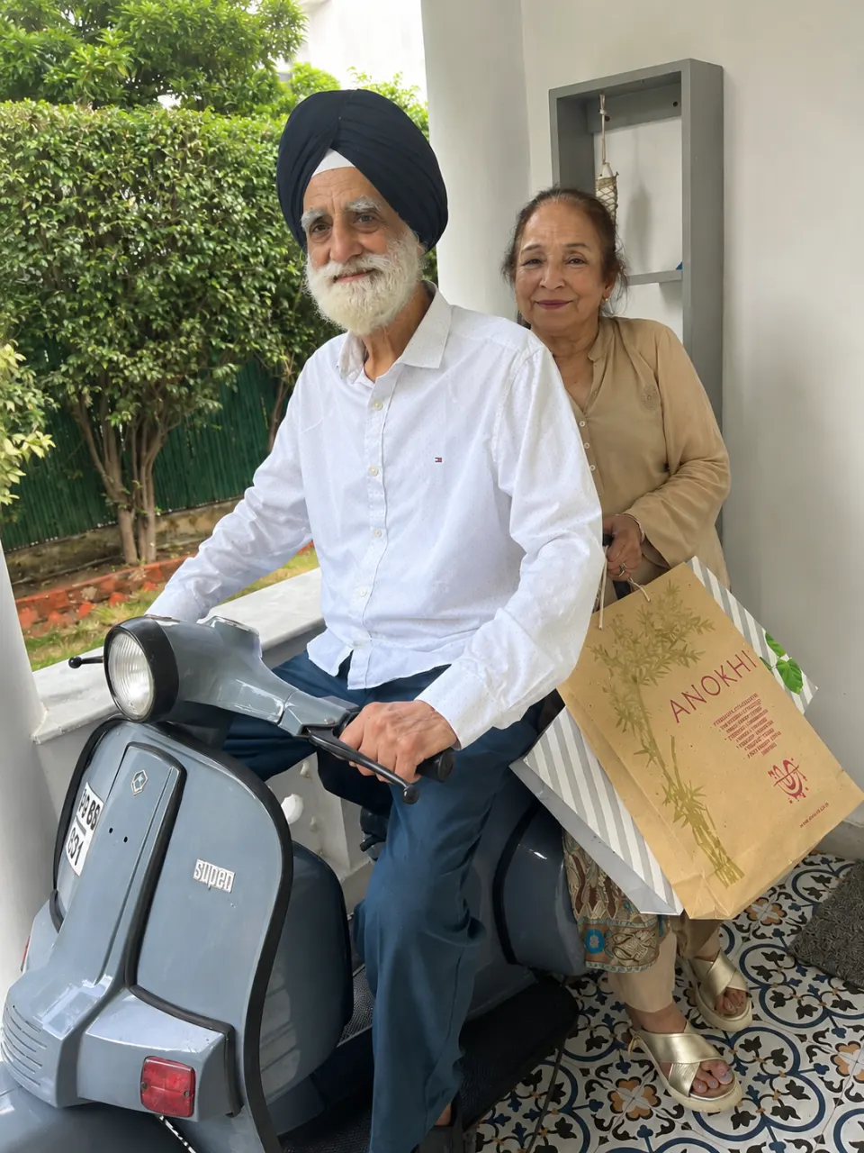 Pritamsingh Meharsingh Chugh and Gurpreet Kaur on a vintage scooter at ArtRest